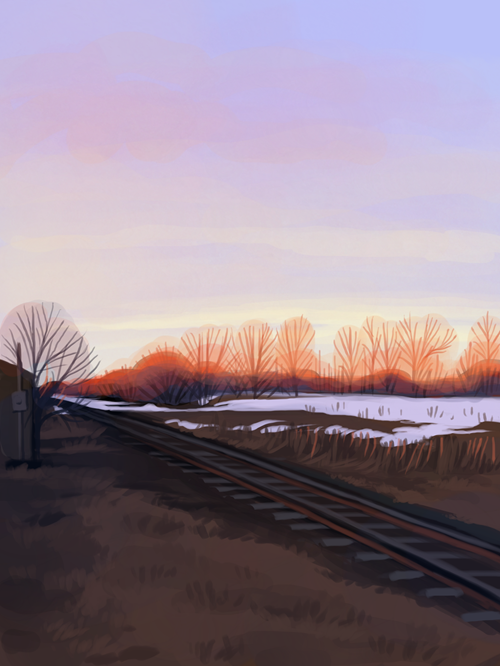 digital image of railroad tracks running through a brown 
                                    field in early spring, with a sunrise in the background making the 
                                    trees glow red